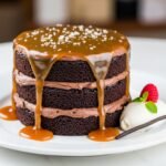 The Ultimate Decadent Chocolate Fudge Layer Cake with Salted Caramel Drizzle