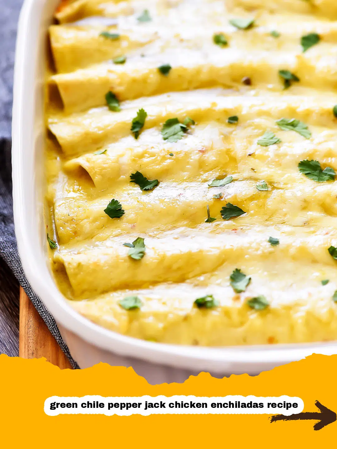 Assembling Green Chile Pepper Jack Chicken Enchiladas Hands preparing green chile pepper jack chicken enchiladas, filling tortillas with shredded chicken, green chiles, and cheese