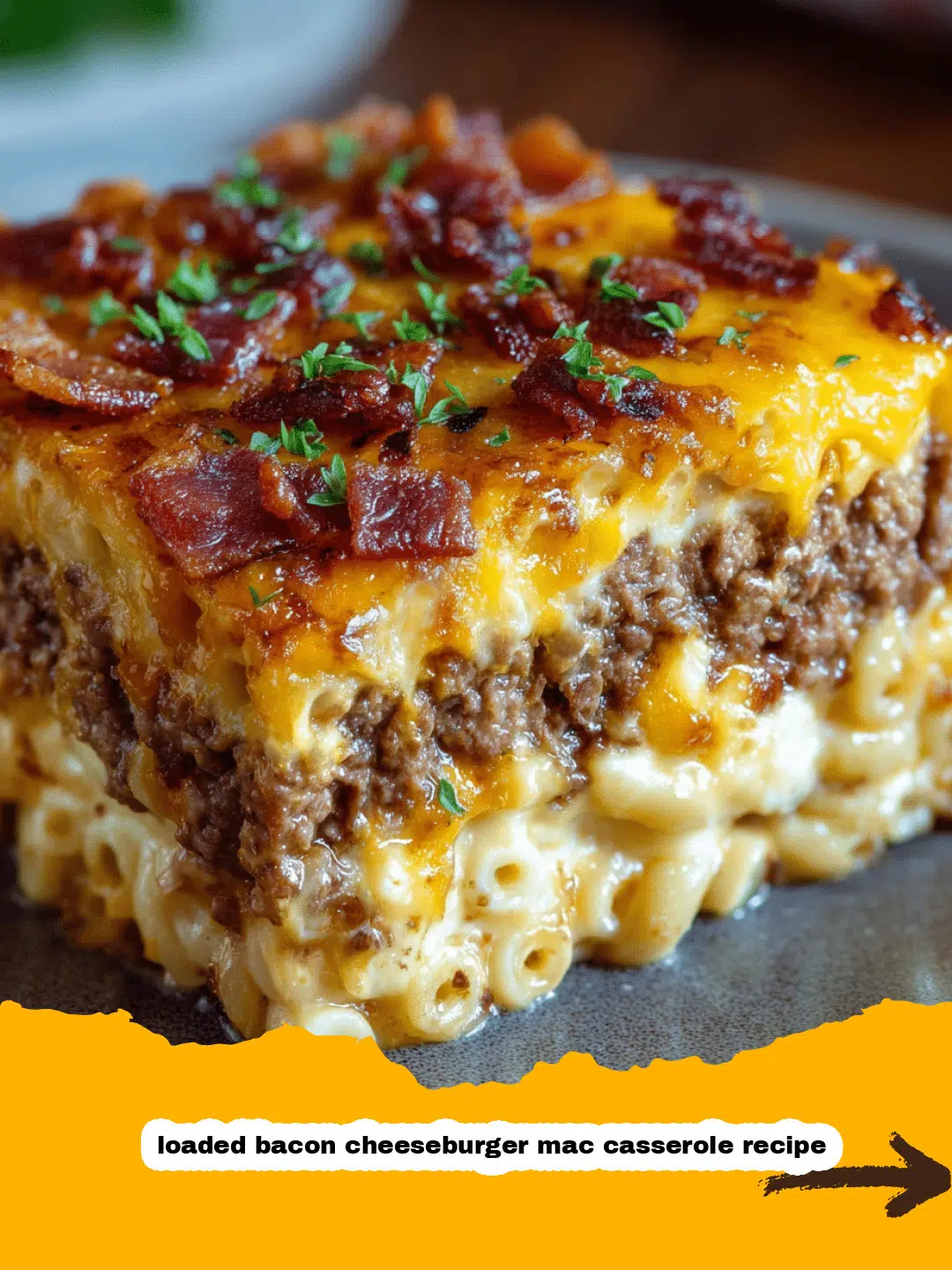 Perfectly Assembled Bacon Cheeseburger Mac Casserole Rich and creamy loaded bacon cheeseburger mac casserole, topped with golden cheese and crispy bacon bits, ready for baking.