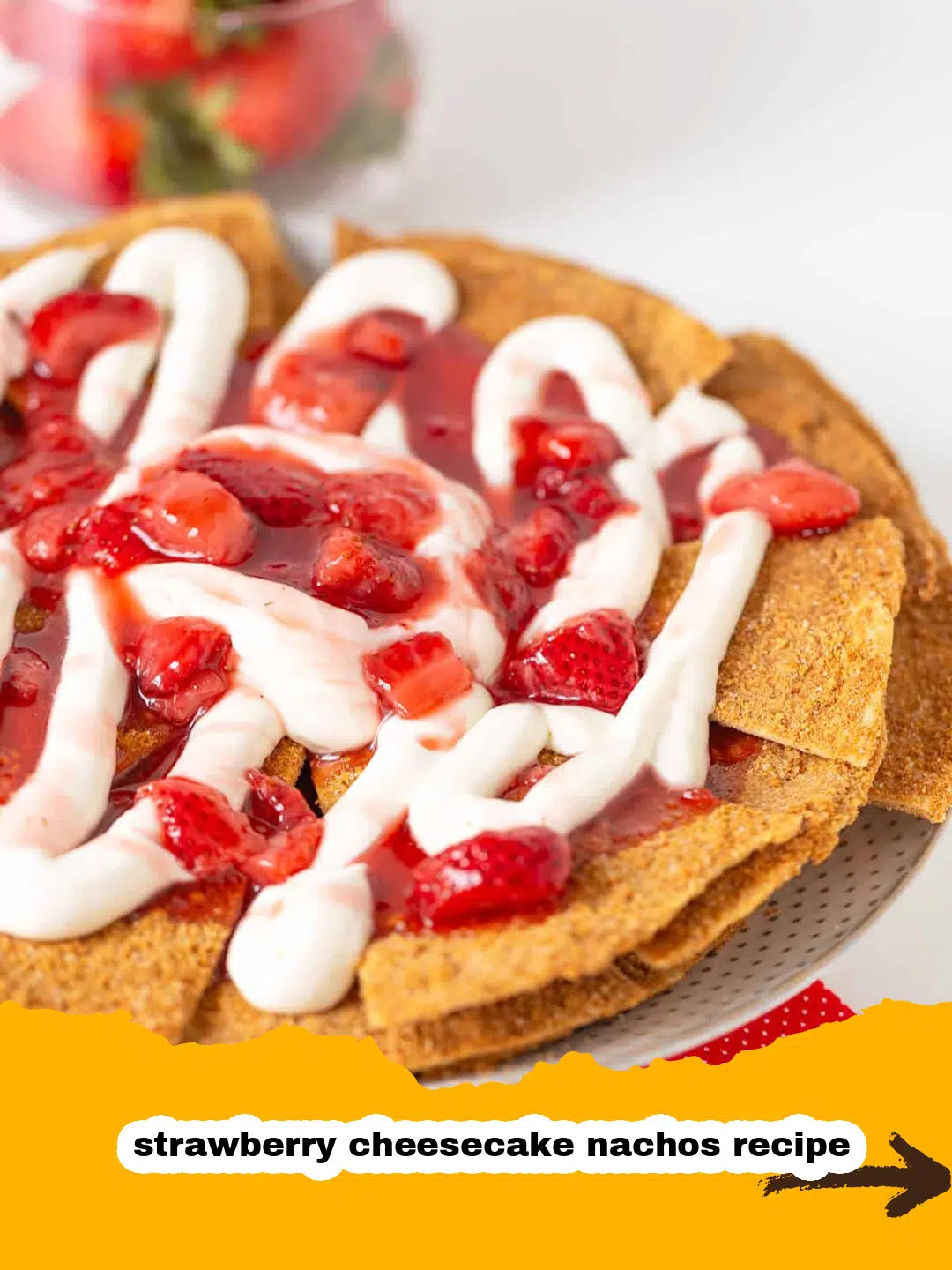 Assembling Strawberry Cheesecake Nachos with Fresh Berries Hand assembling strawberry cheesecake nachos with graham cracker chips, creamy filling, and fresh berries