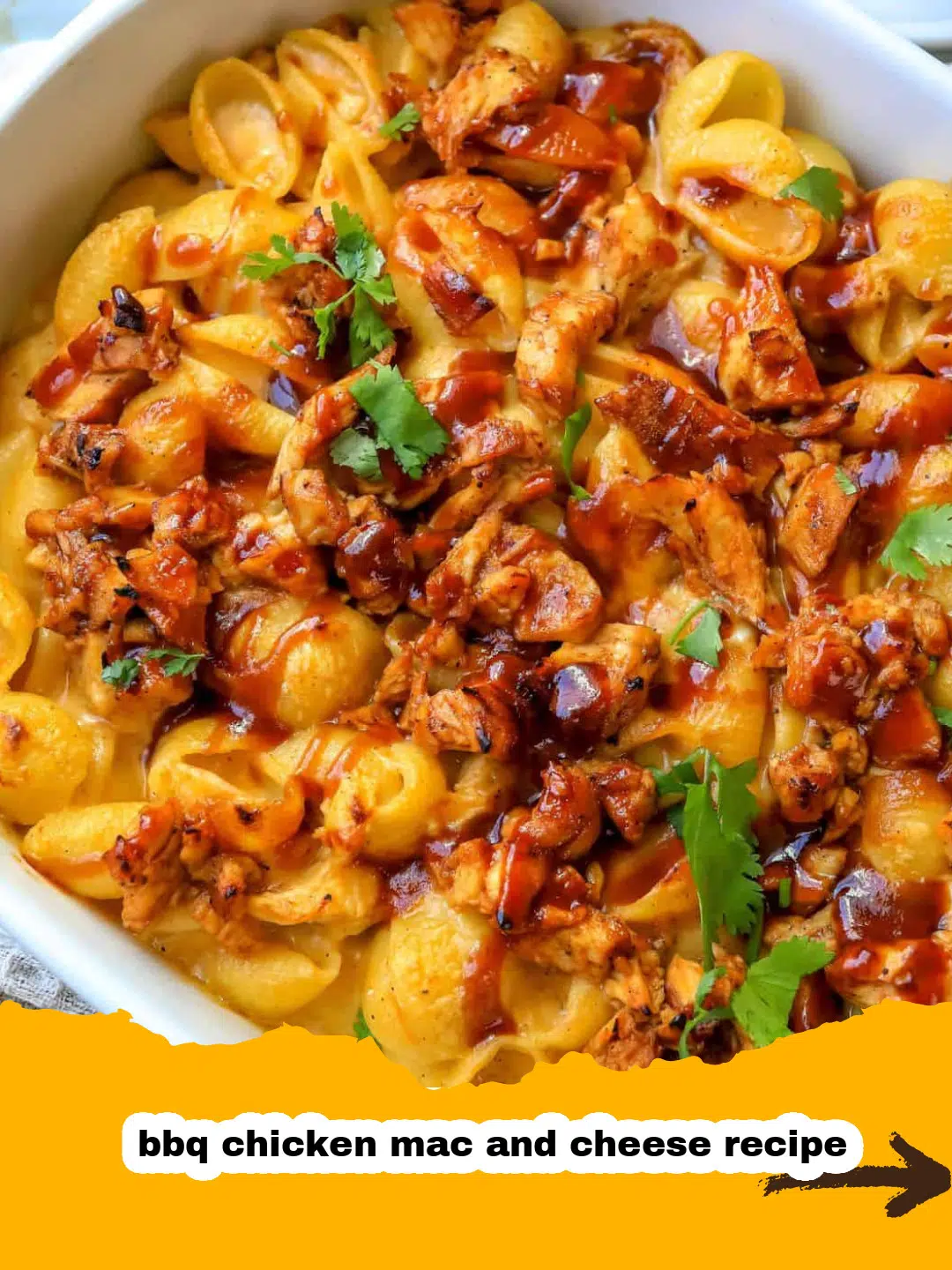 Baking BBQ Chicken Mac and Cheese Creamy BBQ chicken mac and cheese baking in a casserole dish