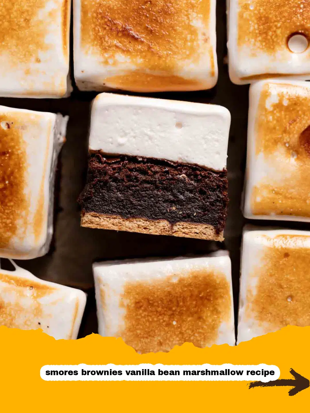 S'mores Brownies with Vanilla Bean Marshmallow Topping Baked S'mores Brownies with Toasted Vanilla Bean Marshmallow Topping in a Baking Pan